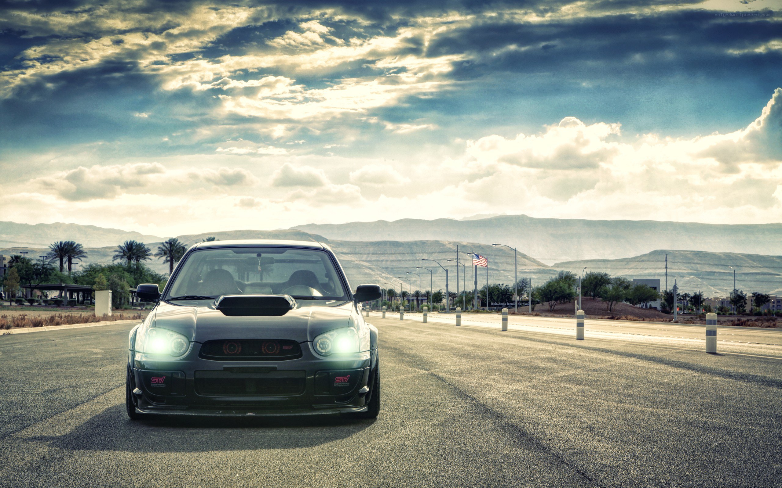 Subaru on a desert road