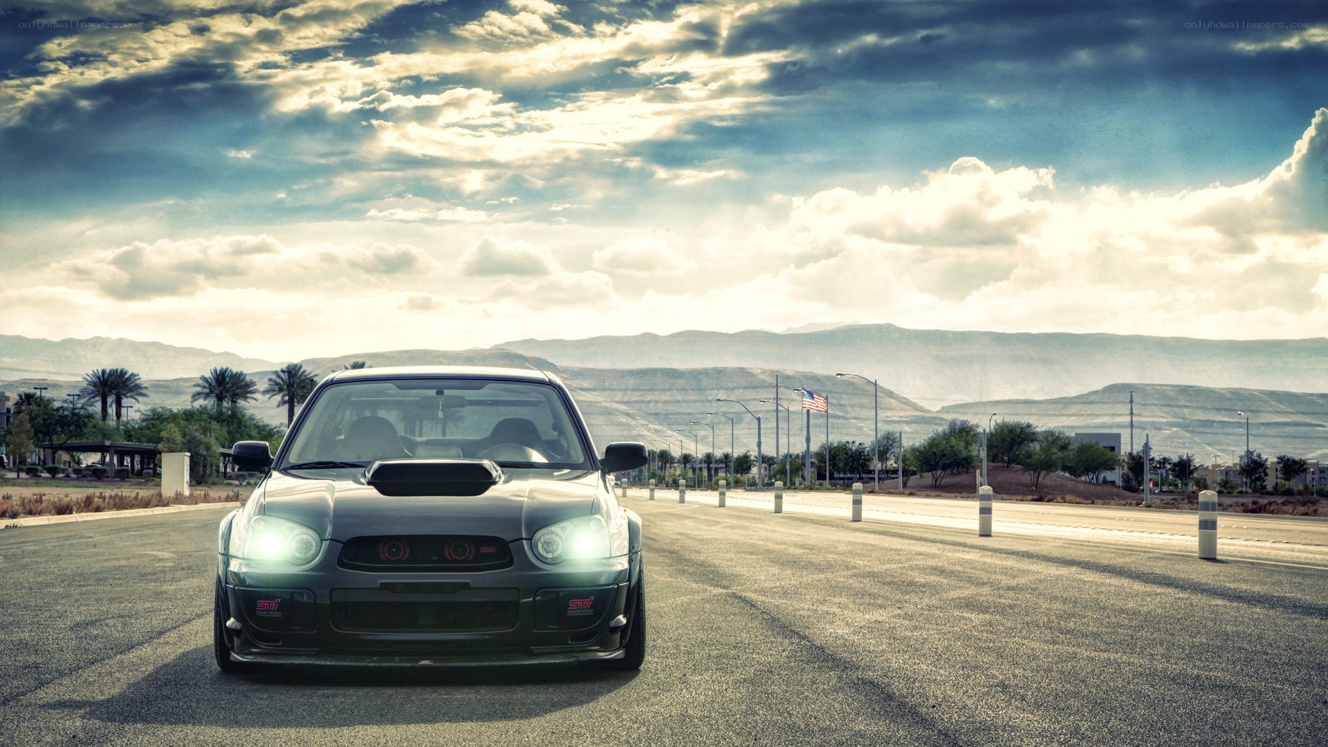 Subaru on a desert road