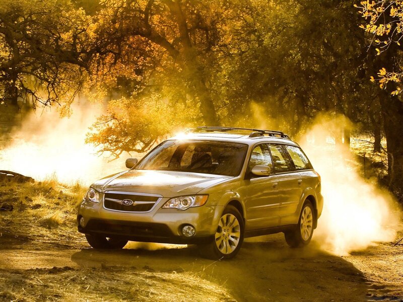 Subaru Outback on dirt road