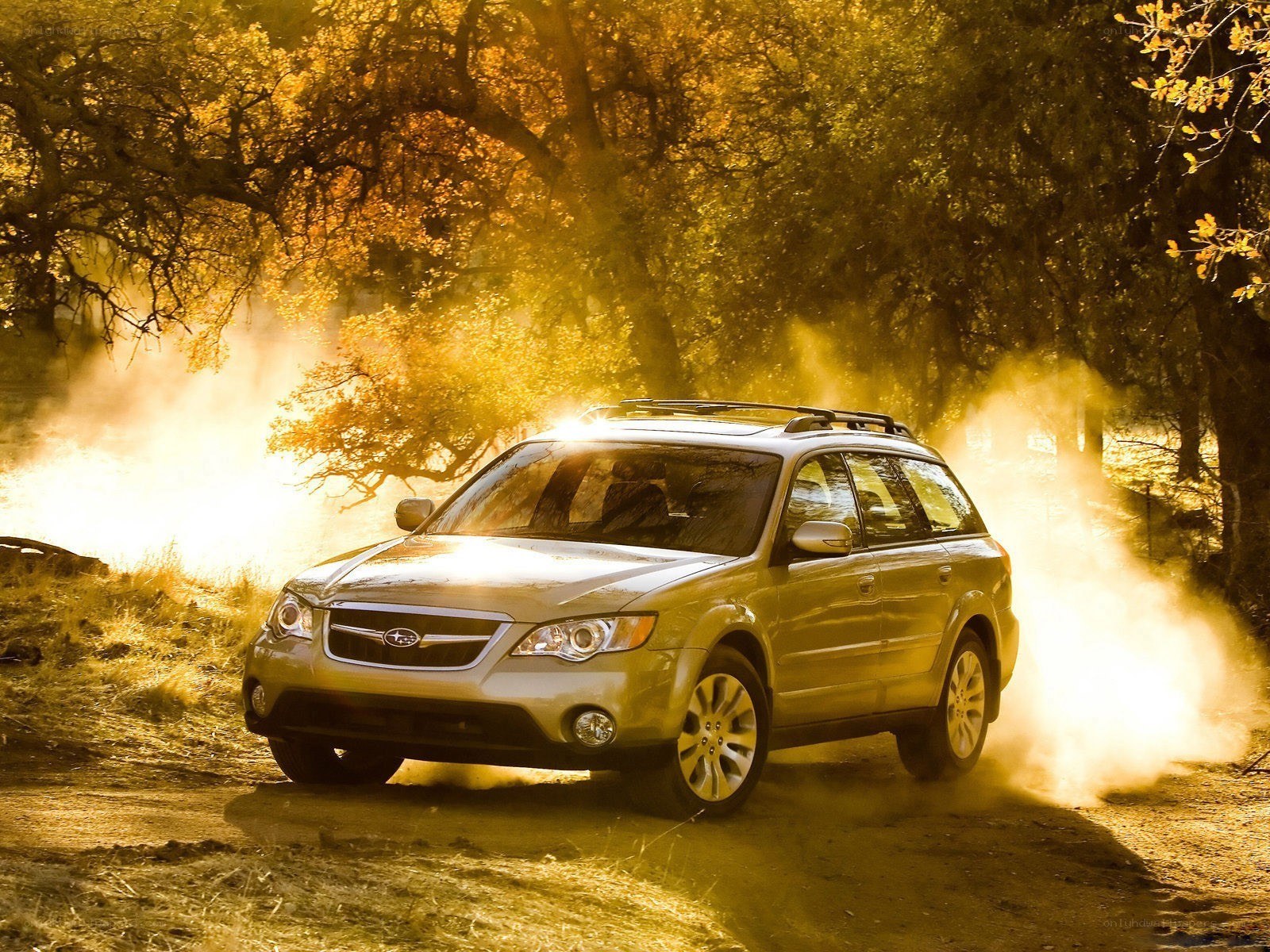 Subaru Outback on dirt road