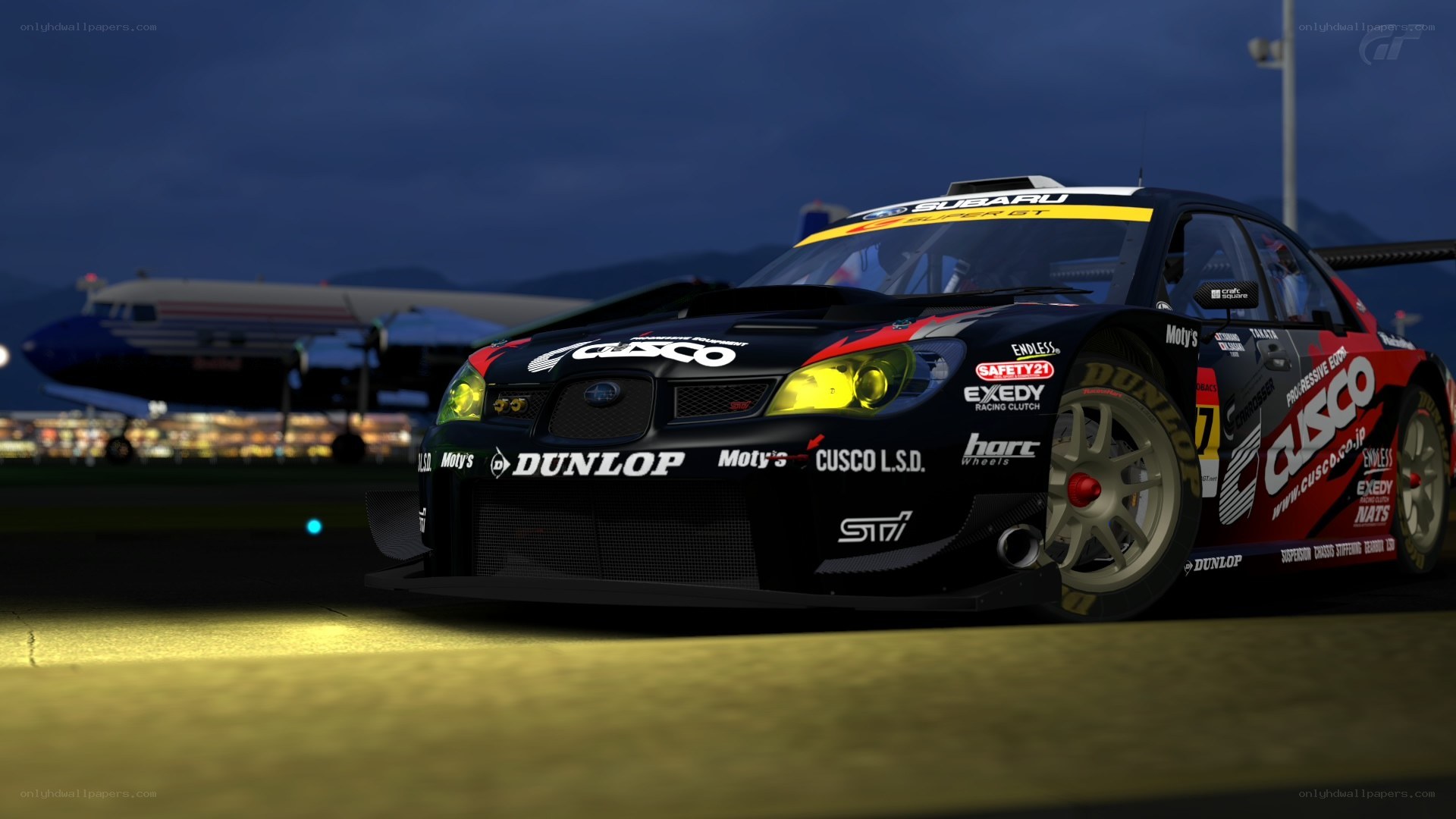 Subaru race car at night