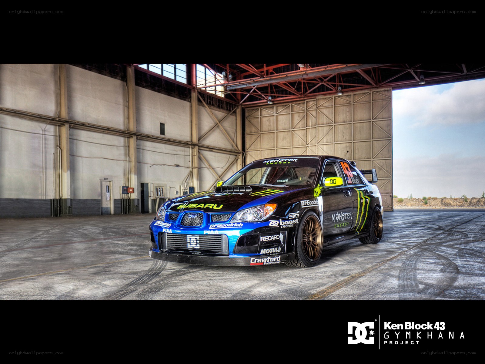 Subaru race car in garage