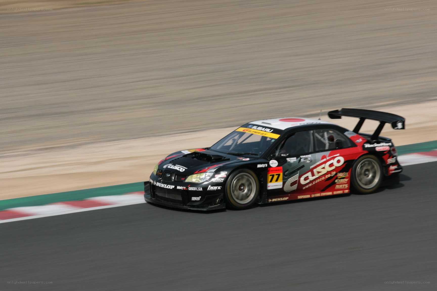 Subaru race car on track