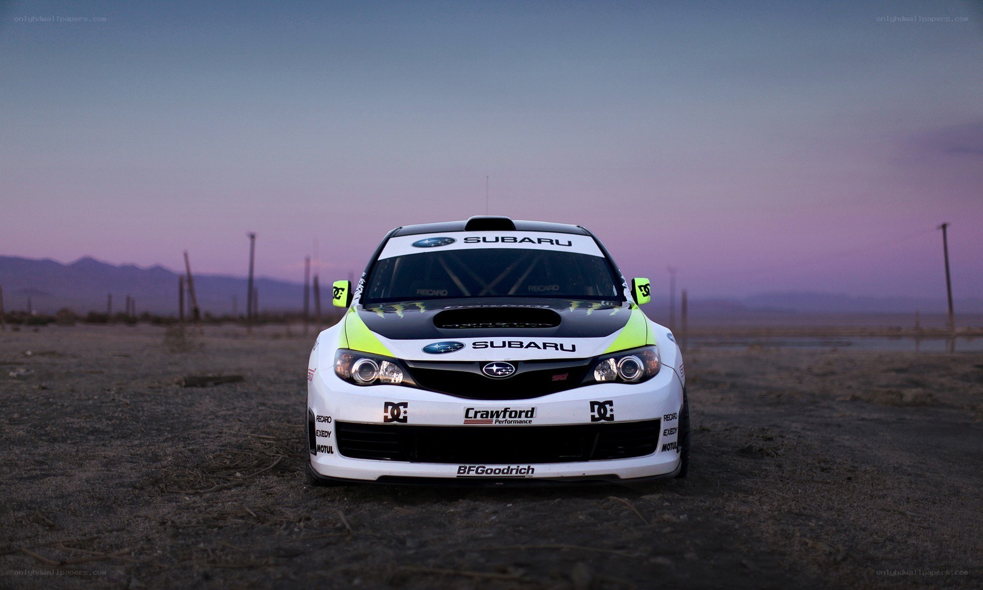 Subaru rally car at dusk