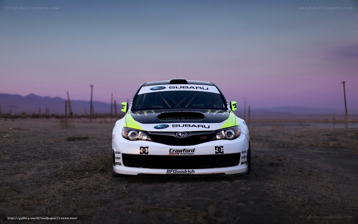 Subaru rally car at dusk