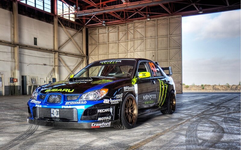 Subaru rally car in garage