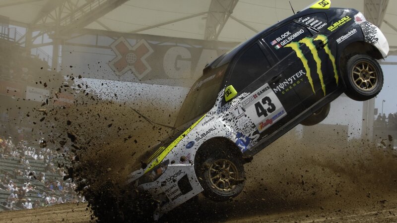 Subaru rally car in mid-air jump
