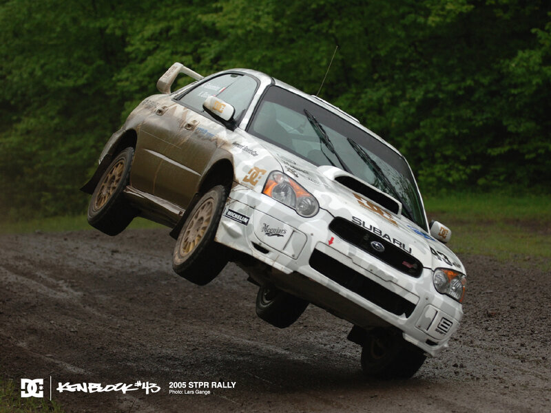 Subaru rally car in mid-air