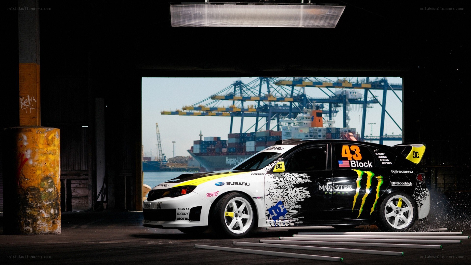 Subaru rally car in warehouse