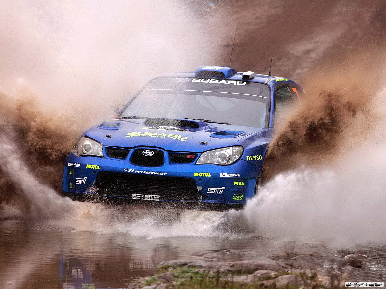 Subaru rally car in water