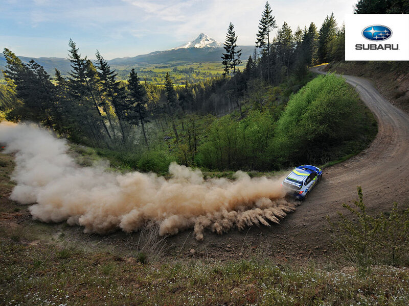 Subaru rally car on dirt road