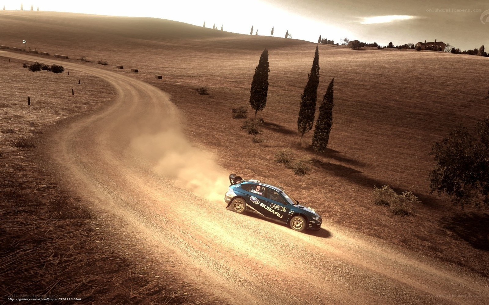 Subaru rally car on dirt road
