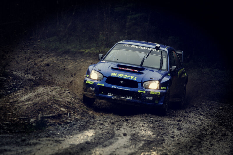 Subaru rally car on dirt road