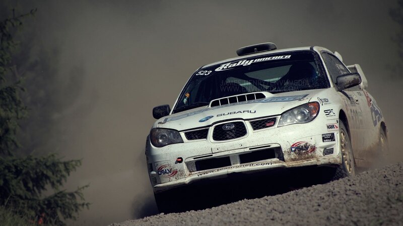 Subaru rally car on dirt road