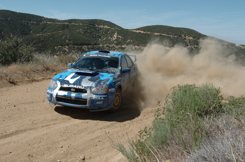Subaru rally car on dirt road
