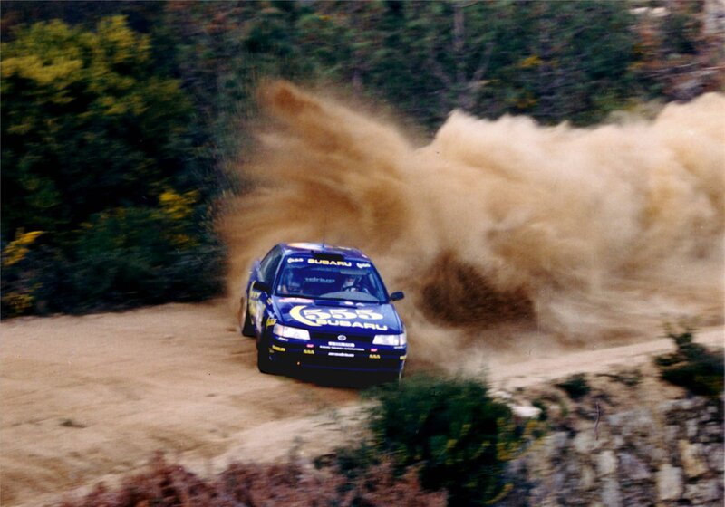 Subaru rally car on dirt track