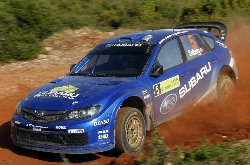 Subaru rally car on dirt track
