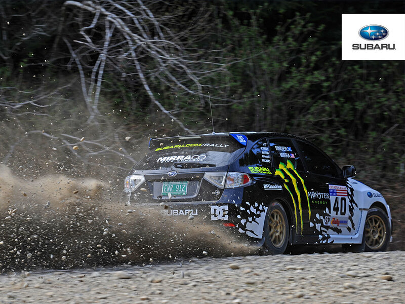 Subaru rally car on dirt track
