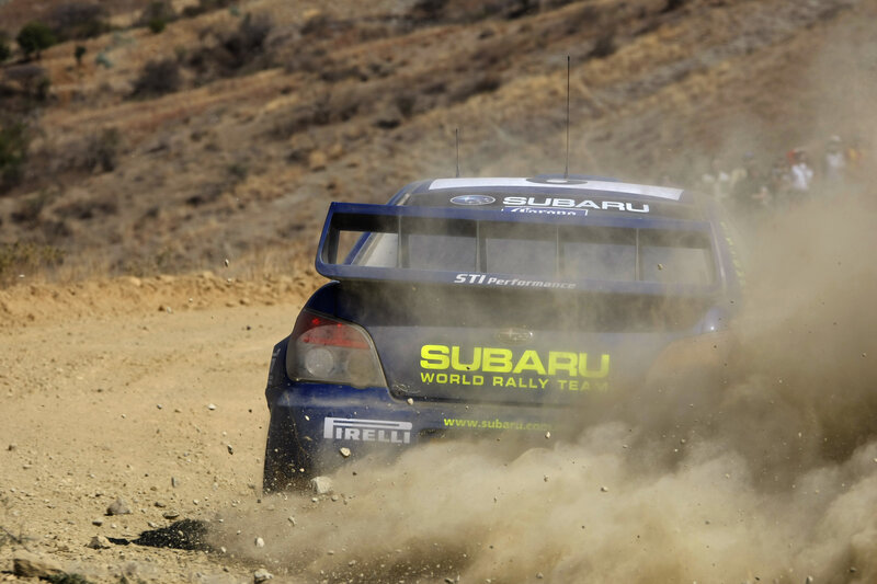 Subaru rally car on dirt track