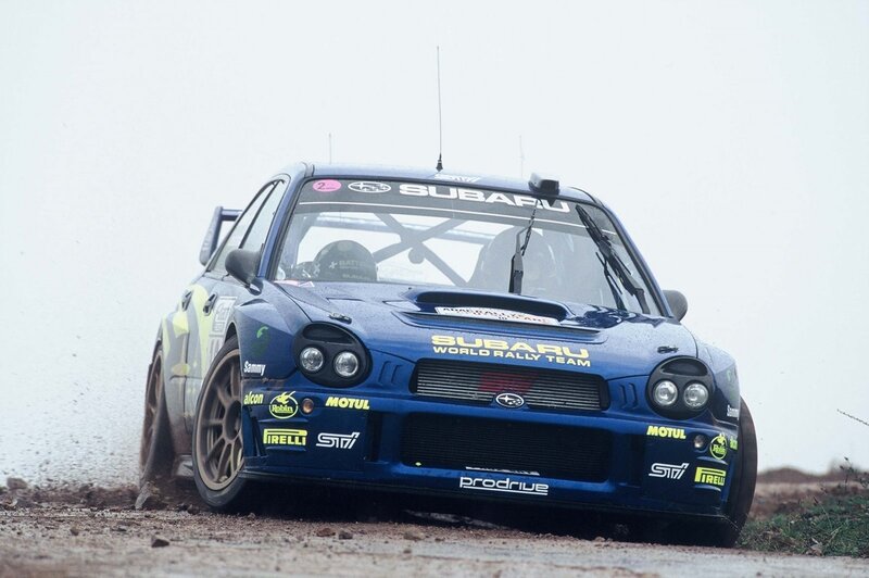 Subaru rally car on dirt track