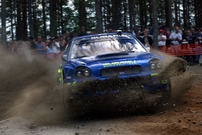 Subaru rally car on dirt track