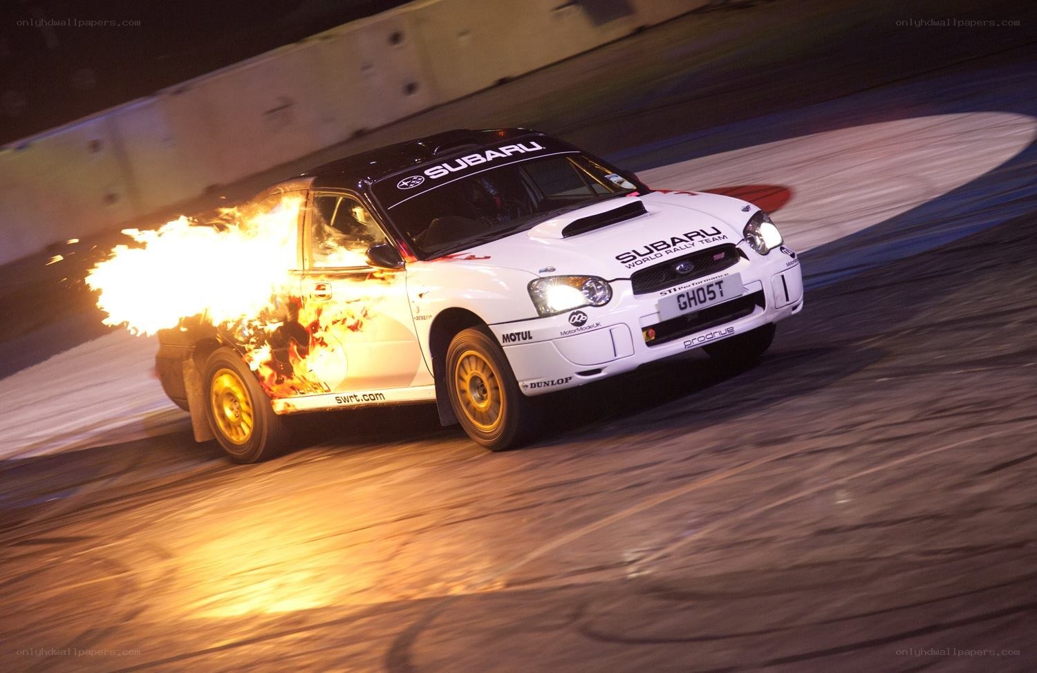Subaru rally car on fire