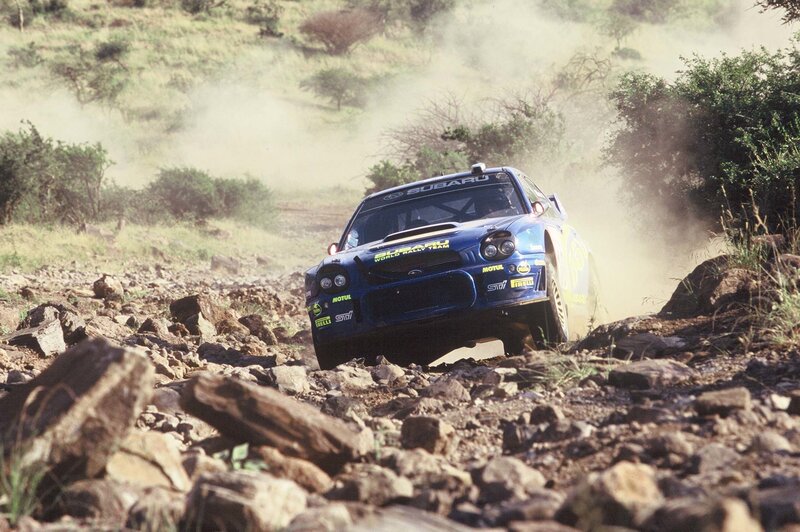 Subaru rally car on rocky terrain