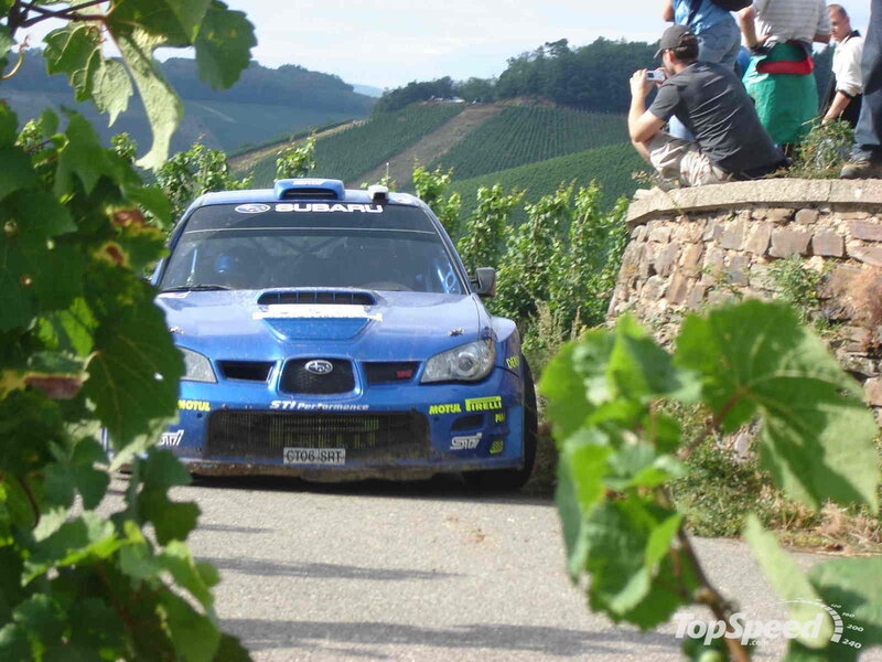 Subaru rally car on vineyard road