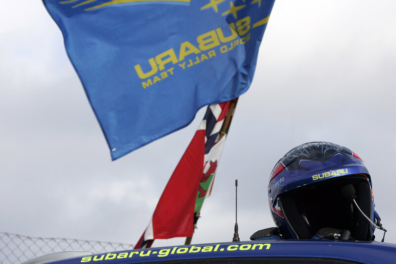Subaru rally helmet and flag