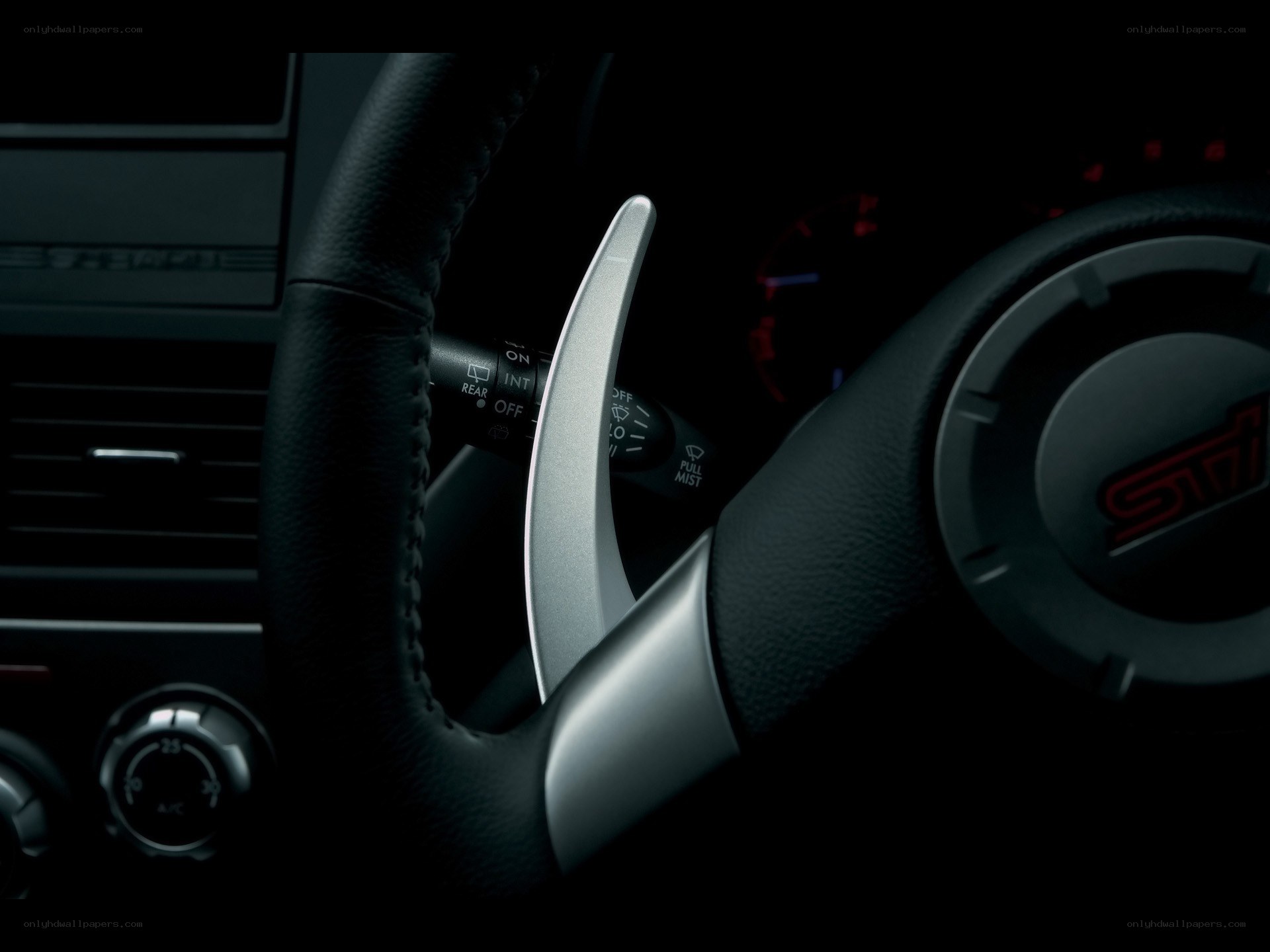 Subaru STI steering wheel close-up