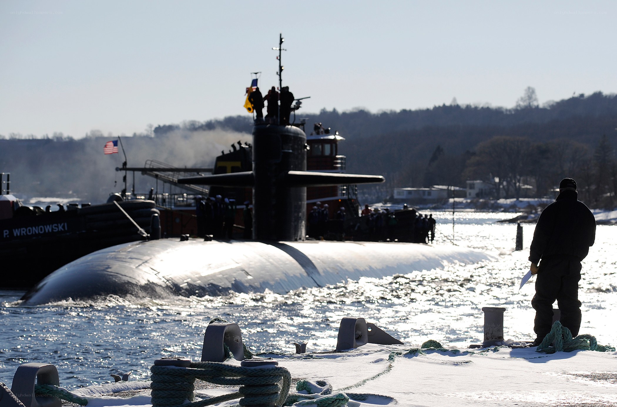 Submarine at a snowy dock