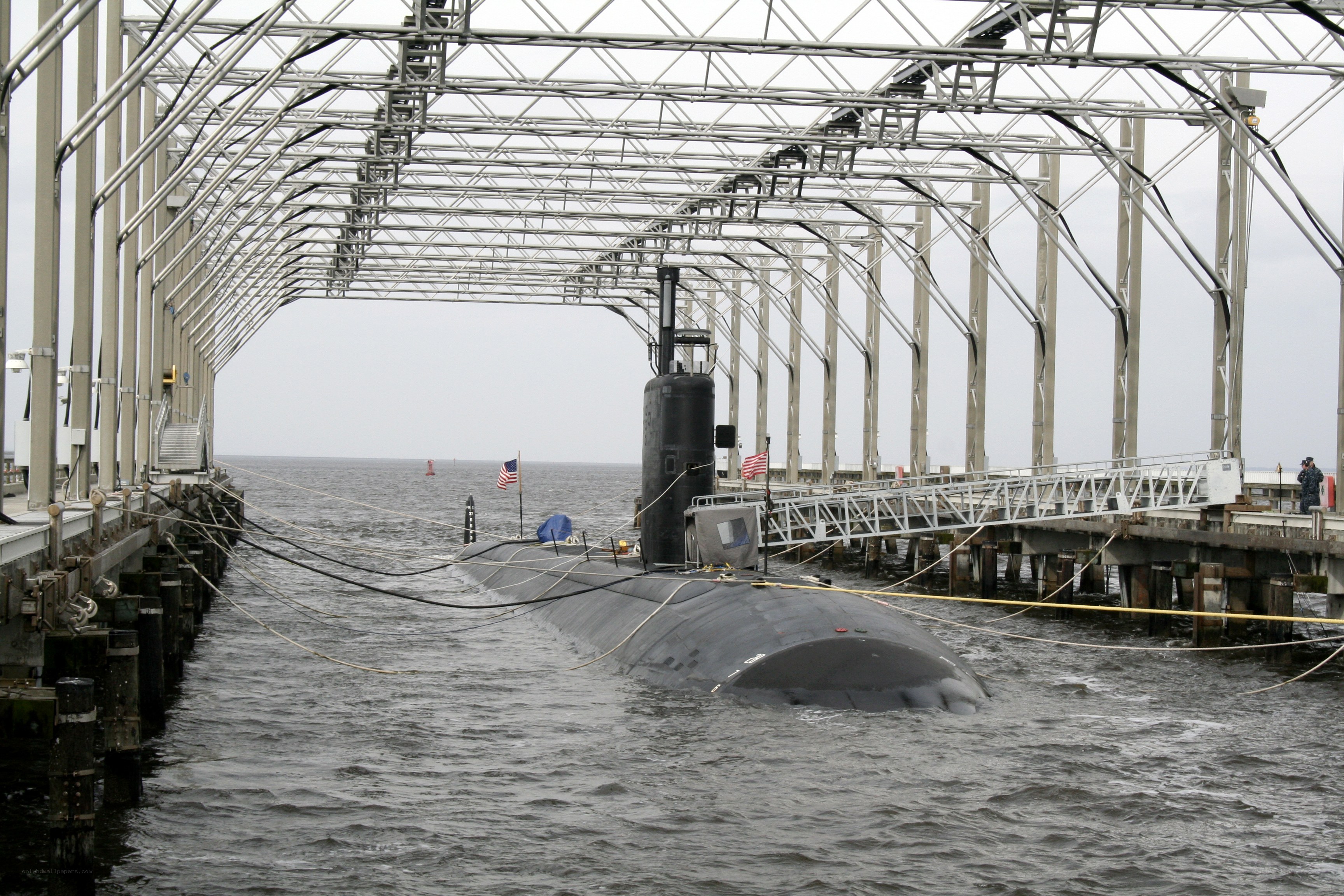 Submarine at docked pier