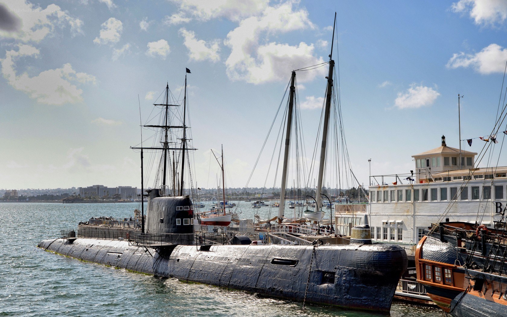 Submarine docked at harbor