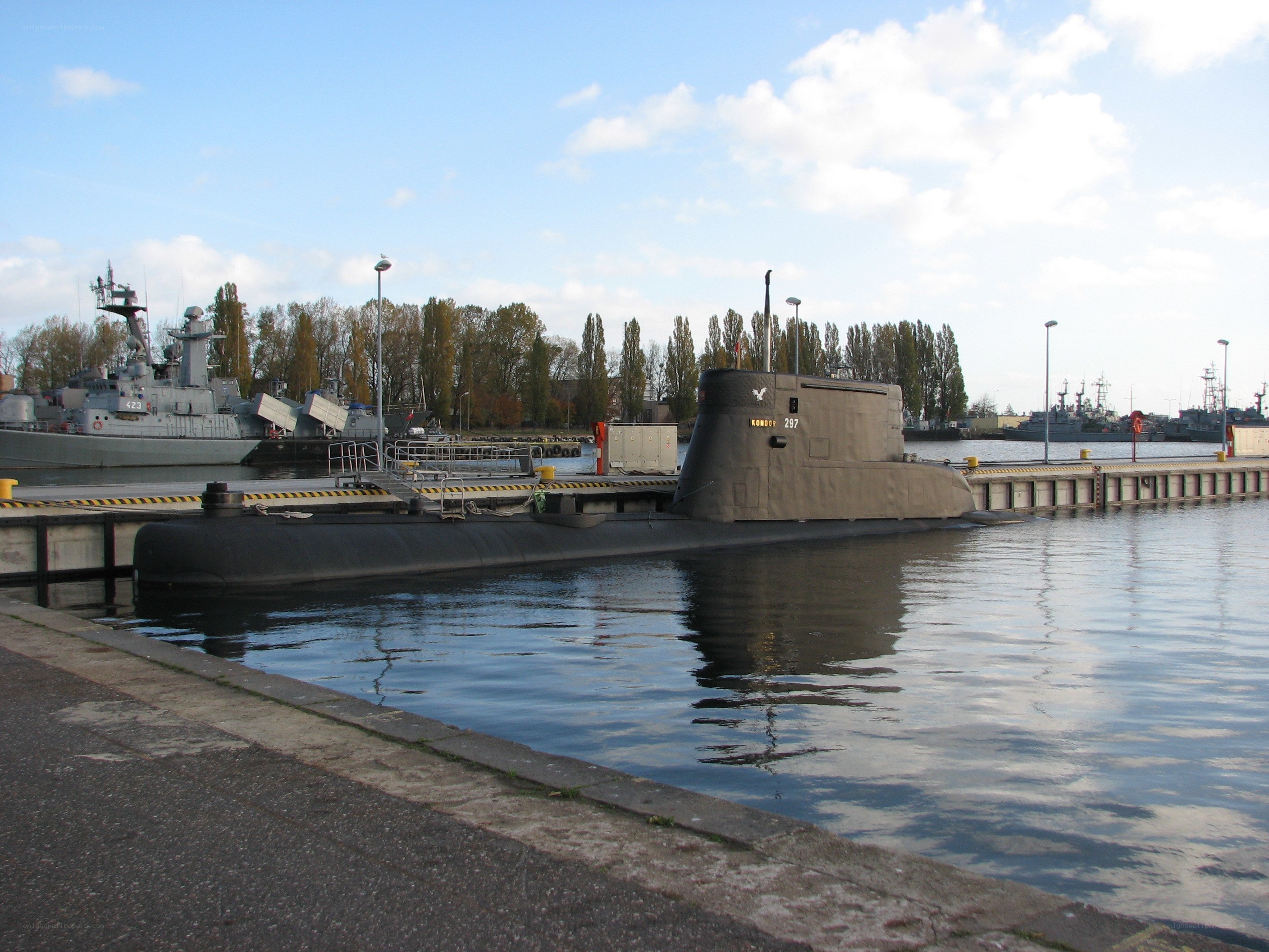Submarine docked at port