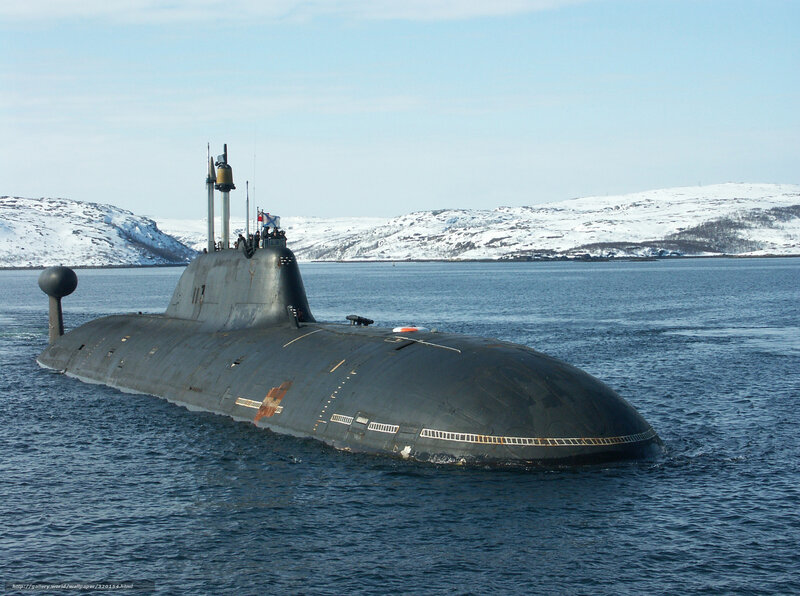Submarine in a snowy harbor