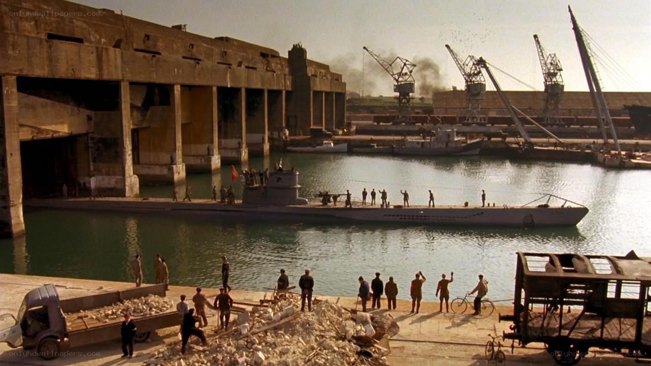 Submarine in a war-torn port