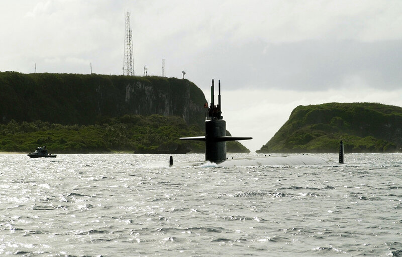 Submarine near coastal island