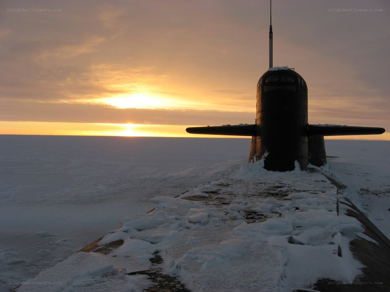 Submarine on Arctic ice at sunset