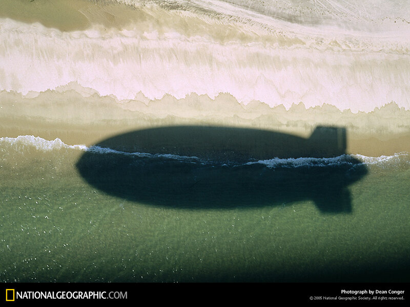 Submarine shadow on beach