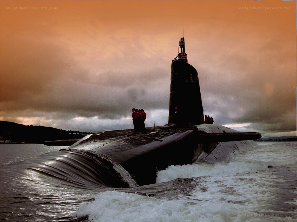 Submarine surfacing at dusk