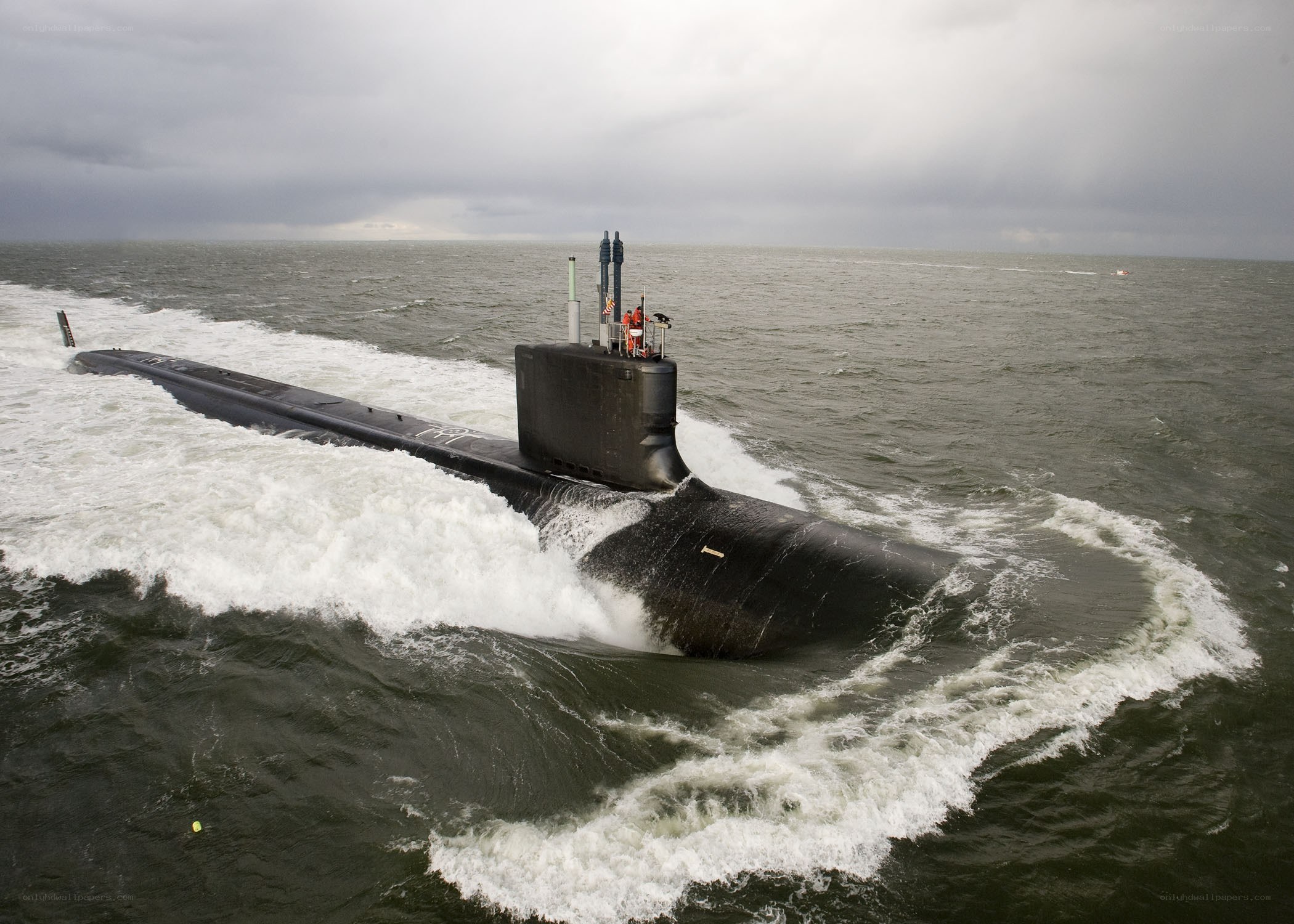 Submarine surfacing in open sea