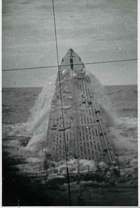 submarine surfacing in rough seas