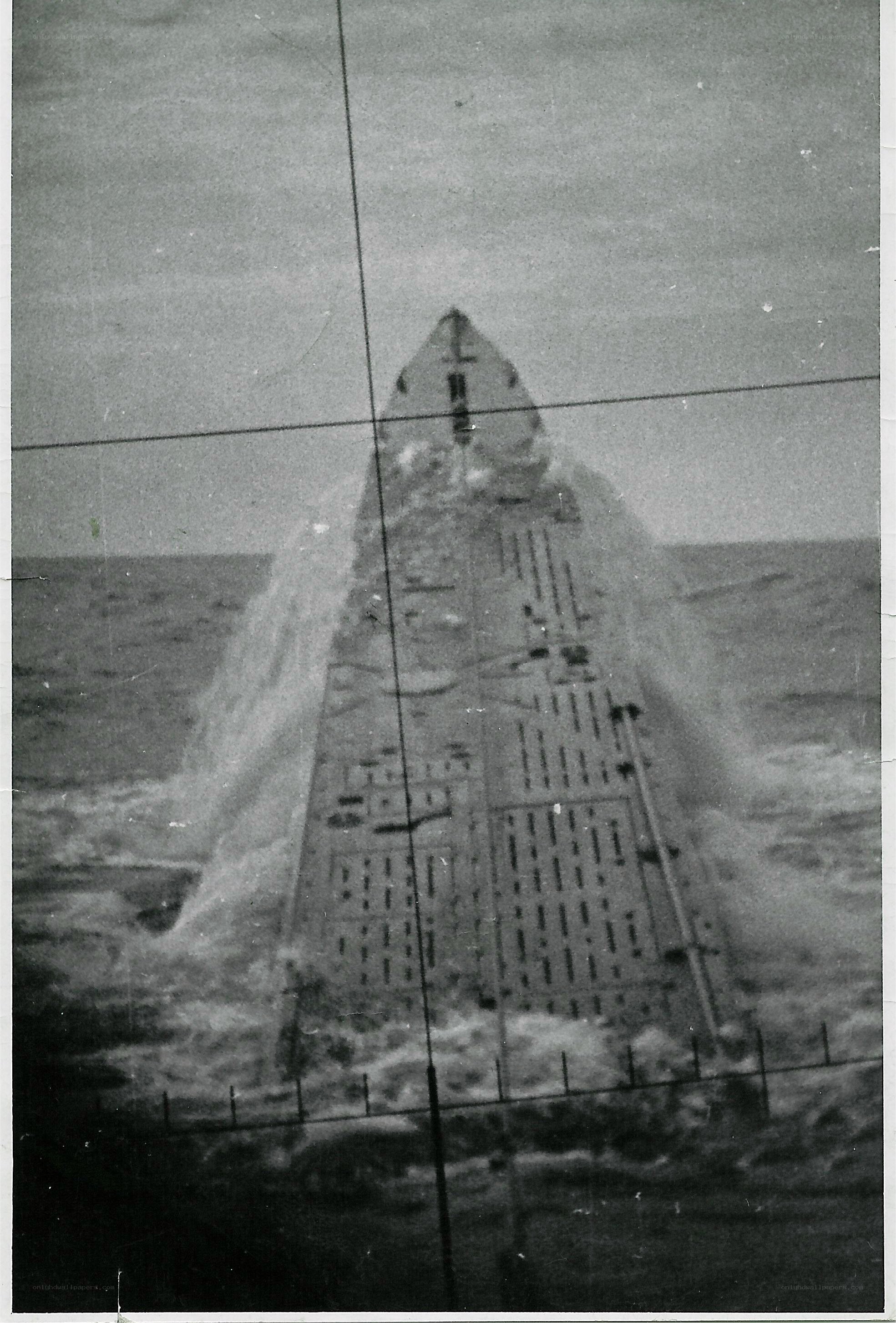 submarine surfacing in rough seas