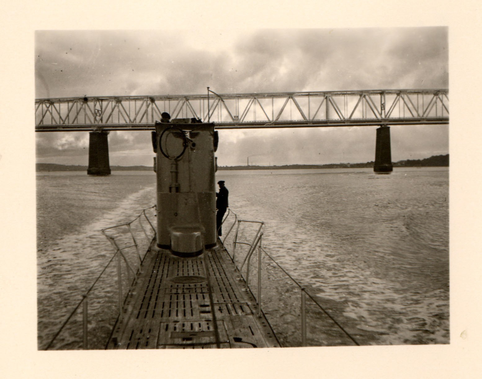 Submarine under a bridge