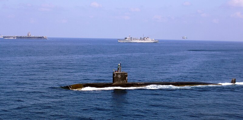 Submarine with naval fleet