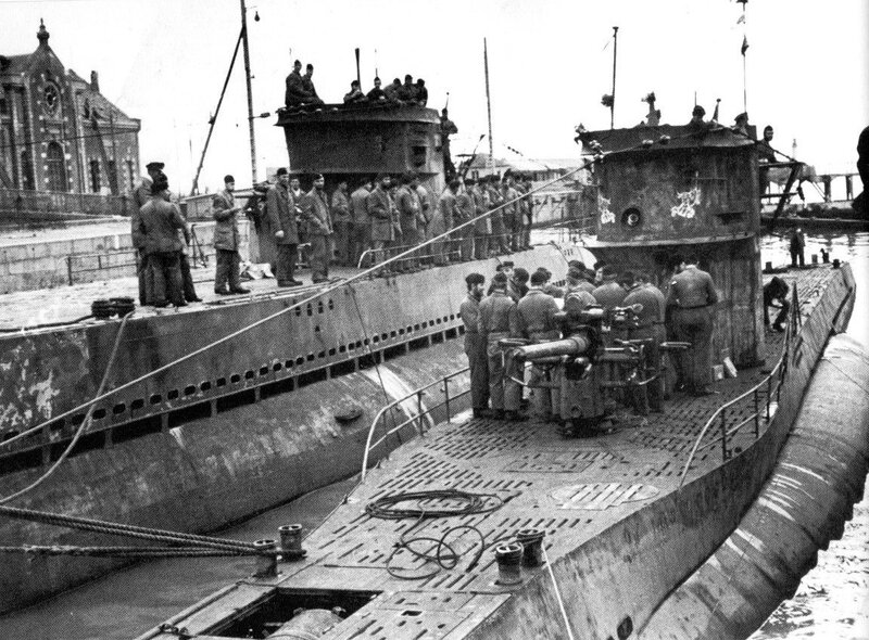 Submarines at a naval dock
