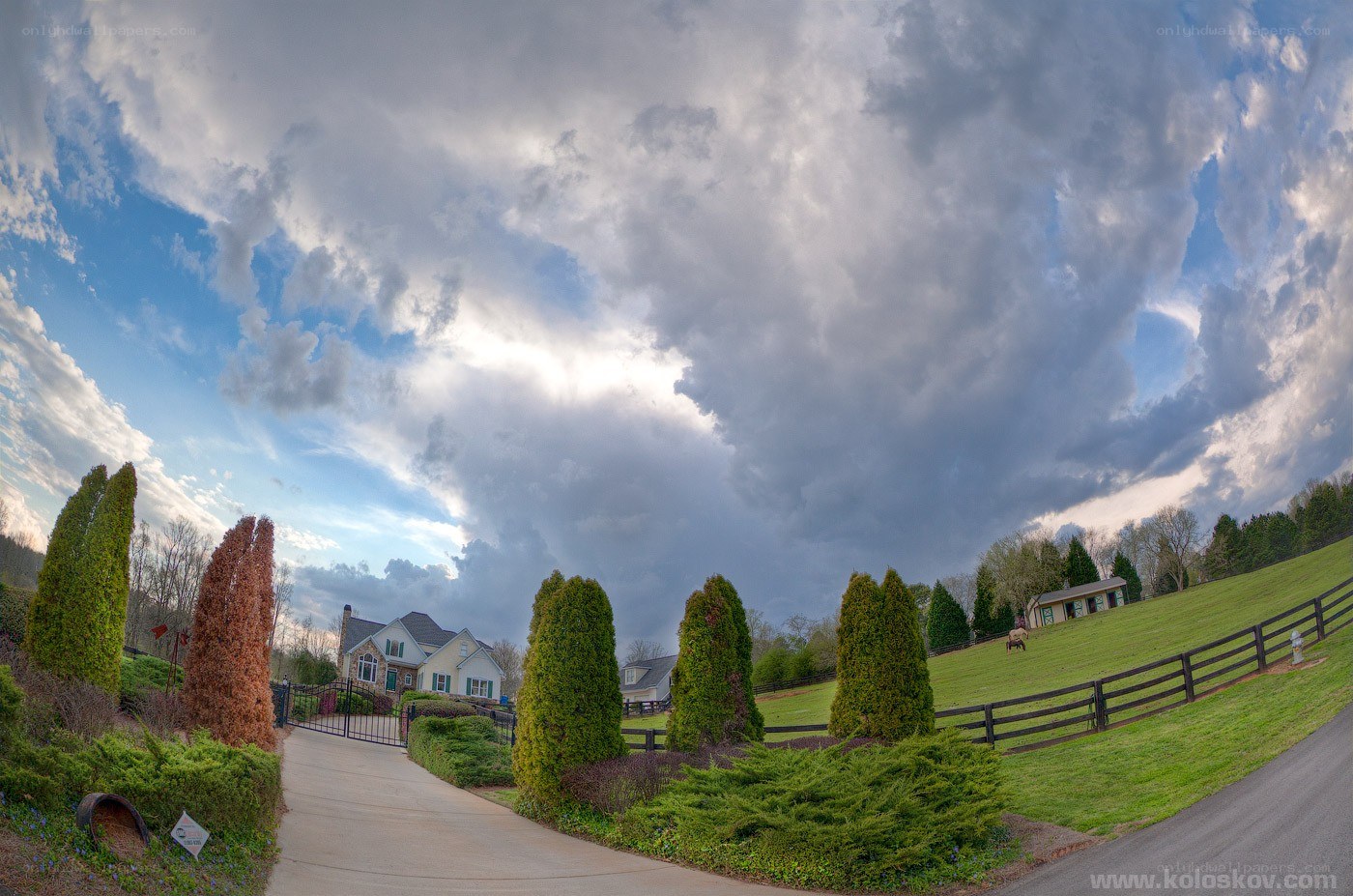 Suburban home with dramatic sky