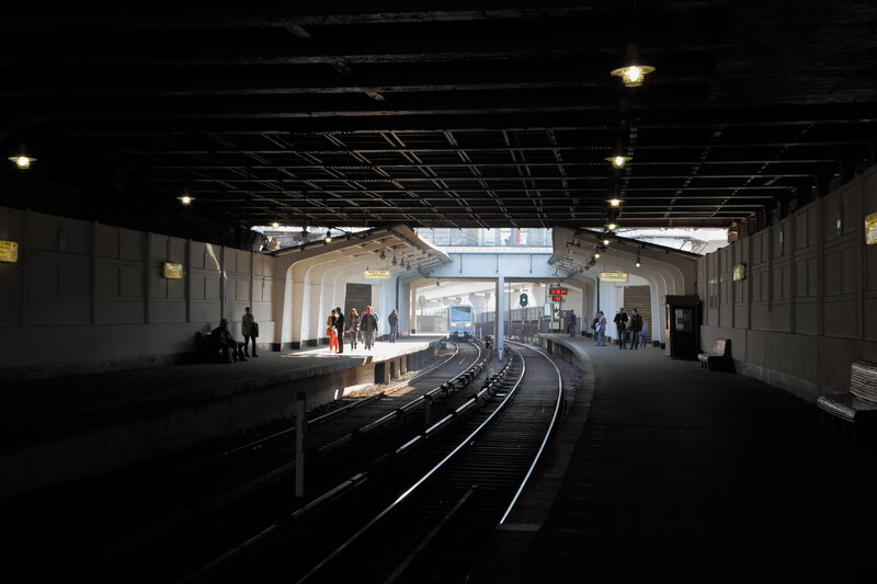 Subway station with arriving train