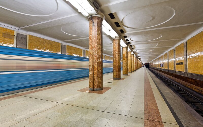 Subway station with blue train