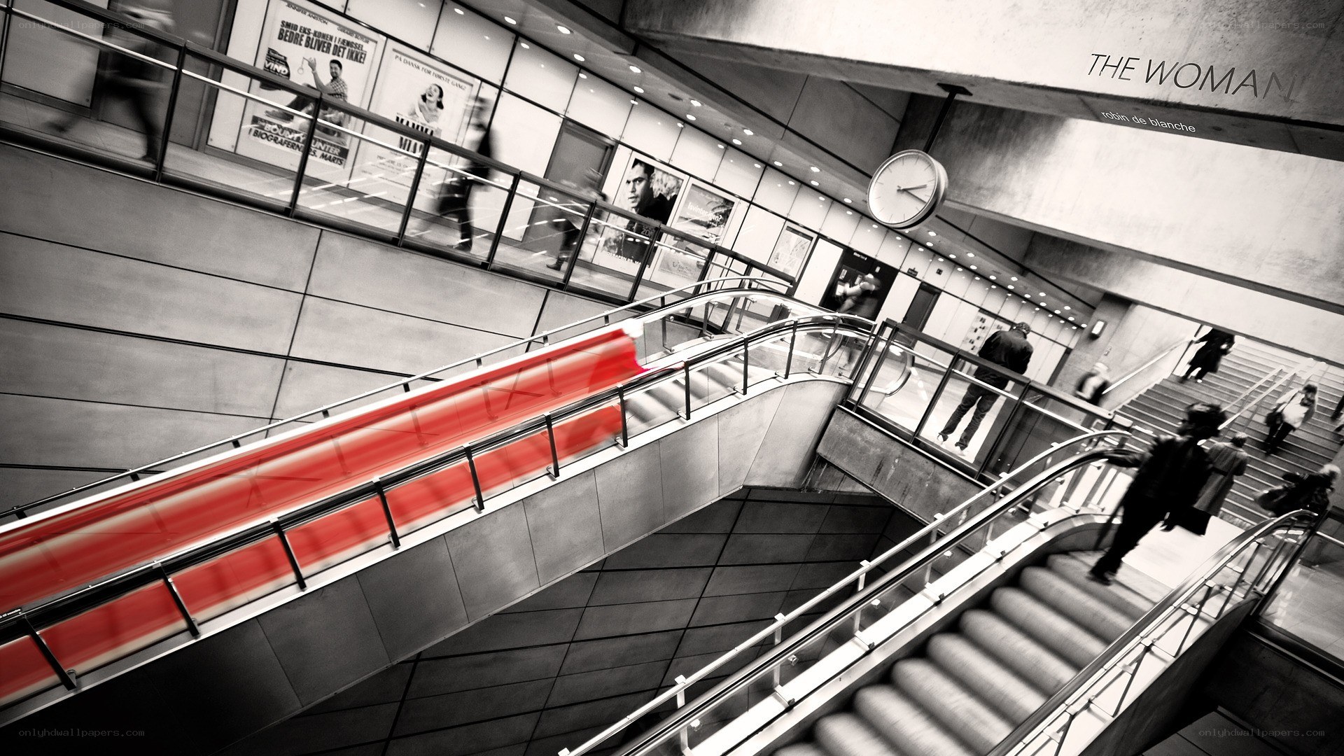Subway station with red escalator